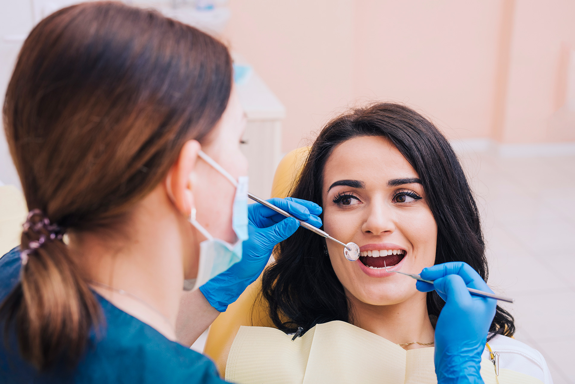 dentist-examining-teeth